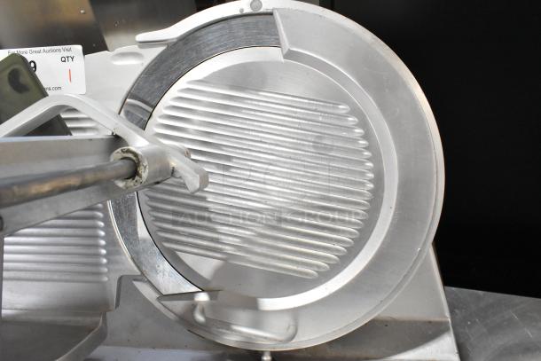 Bizerba metal commercial countertop meat slicer on stainless steel stand, 115V, 1 phase, in good condition.
