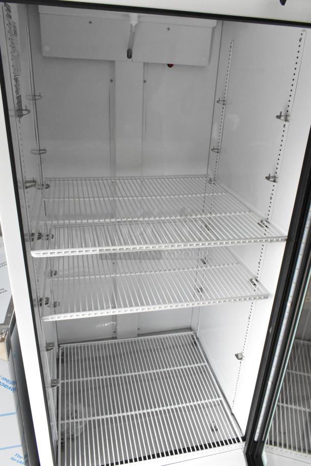 2021 True TSCI-600R-G-PH metal single door cooler, poly coated racks, 115V, 1 phase, clean interior, excellent condition.