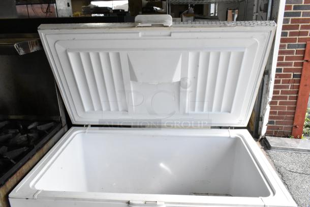 Whirlpool WZC3115DW00 metal chest freezer, 115 volts, open lid, clean interior, suitable for storage, ideal for auction.