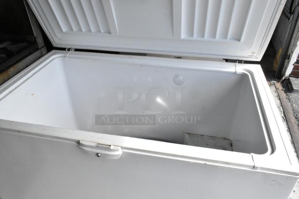Whirlpool WZC3115DW00 metal chest freezer, open lid, clean interior, 115V, 1 phase, minor scuffs, used condition.