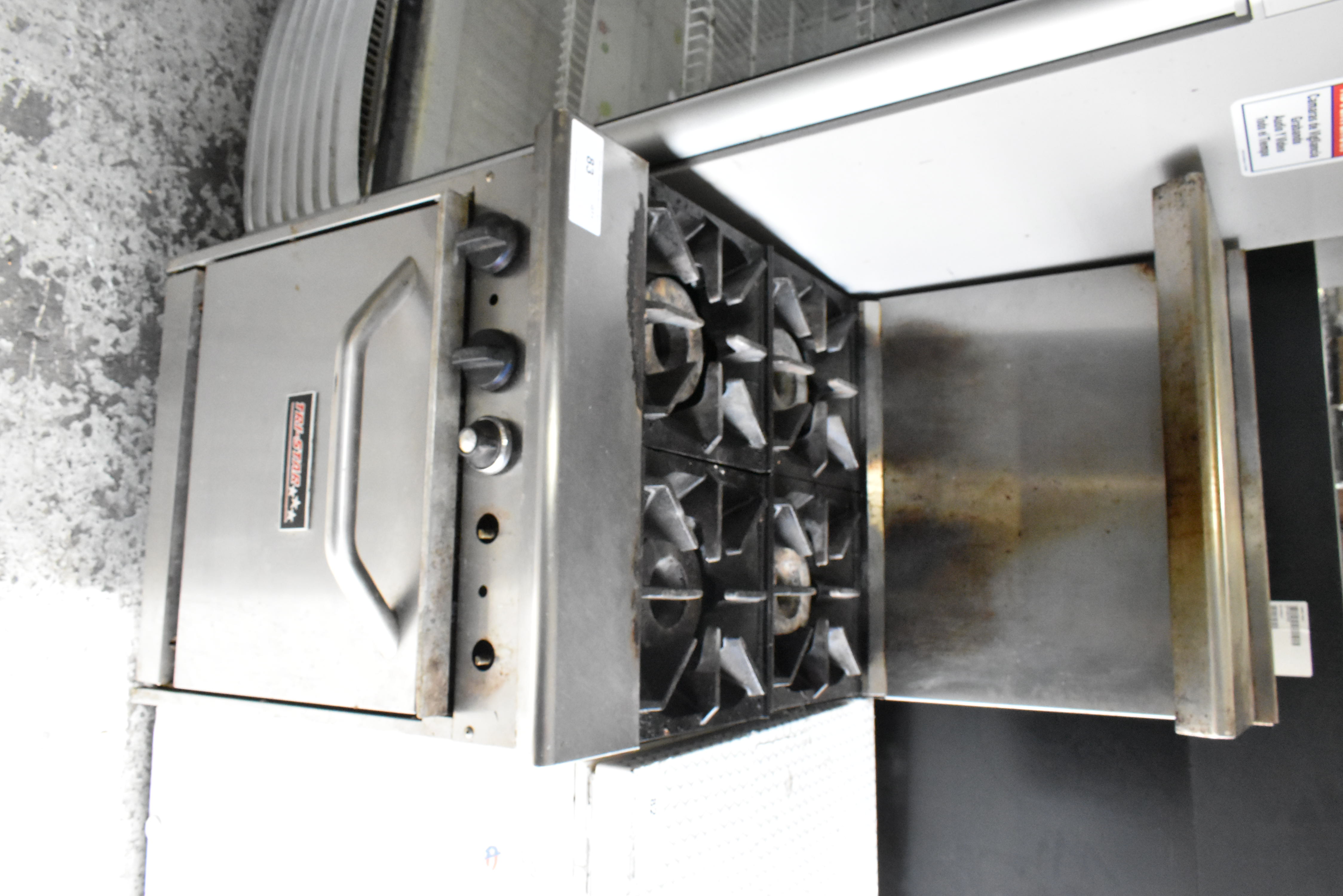 Commercial range back splash with moderate use accumulation