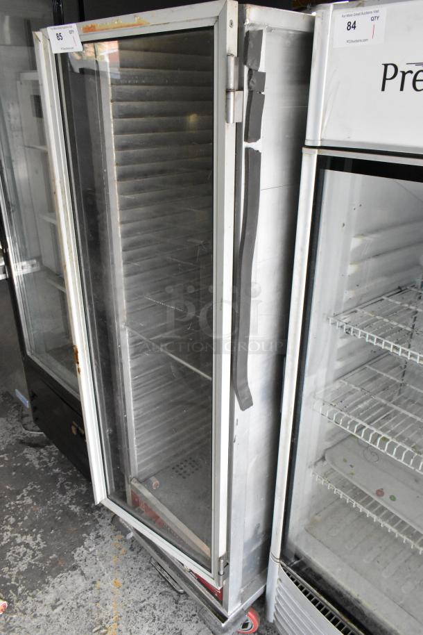 Winholt NHPL-1836CA/LC heated holding pan rack on commercial casters. Door does not stay closed. 120V, 1 phase.