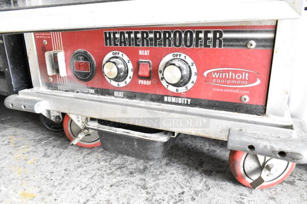 Winholt NHPL-1836CA/LC heated pan rack on casters, door issue, 120V, 1 phase. Visible controls for heat and humidity.