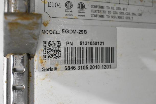 EGDM-29B label with model, part number 9131050121, and serial number 6846 3105 2010 1201, showing signs of wear.