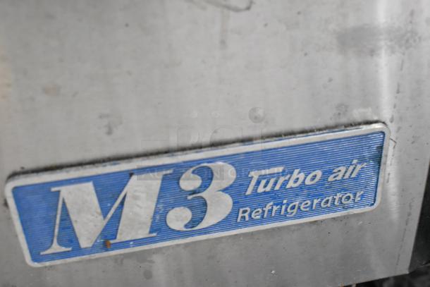 Turbo Air MST-60-24 commercial prep table with M3 logo visible. Features casters, 115V, 1 phase, good condition.