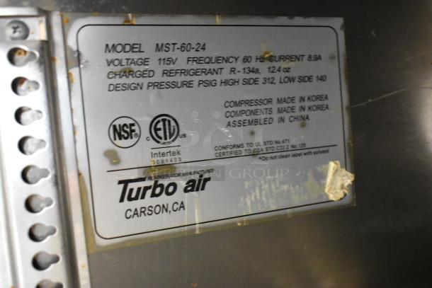 Turbo Air MST-60-24 metal commercial sandwich prep table label, showing model, voltage, and certifications.