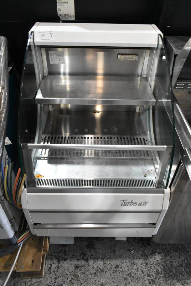 Turbo Air TOM-30L(W) metal commercial open merchandiser, floor style, glass front, 120 volts, 1 phase, good condition.