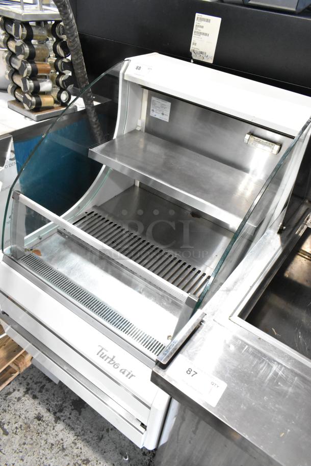 Turbo Air TOM-30L(W) metal commercial merchandiser, open grab n go style, 120V, 1 phase, excellent condition, visible logo.