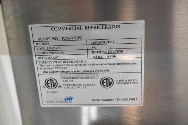 Turbo Air TOM-30L(W) commercial refrigerator label showing model, voltage, refrigerant type, and certification details.