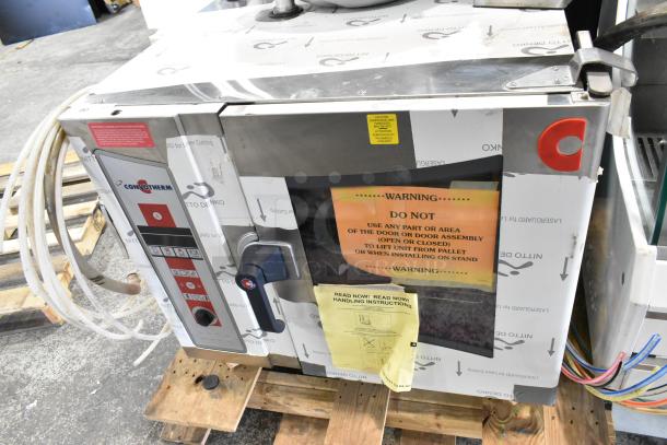 Brand new Convotherm OES-6.10 stainless steel electric combi oven, 208/240V, 3 phase, with warning labels.