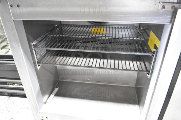 2021 Asber AUTF27 stainless steel undercounter freezer, single door, 115V, 1 phase, clean interior, adjustable shelves.