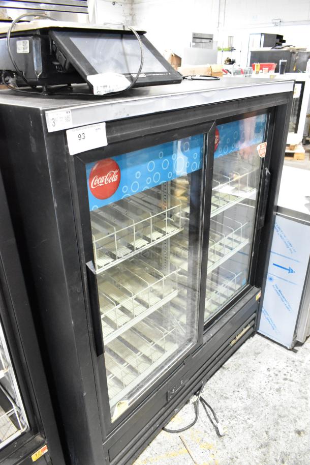 True GDM-41SL-54EM-LD 2-door reach-in cooler merchandiser with poly-coated racks, used condition, 115V, 1 Phase.
