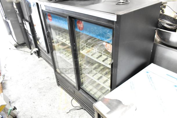True GDM-41SL-54EM-LD metal commercial 2-door cooler with glass doors and poly-coated racks. 115V, 1 phase.