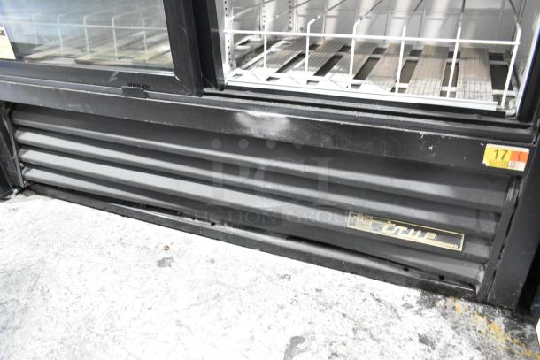 True GDM-41SL-54-LD commercial cooler, black metal, 2 glass doors, poly coated racks, 115V, visible True logo.