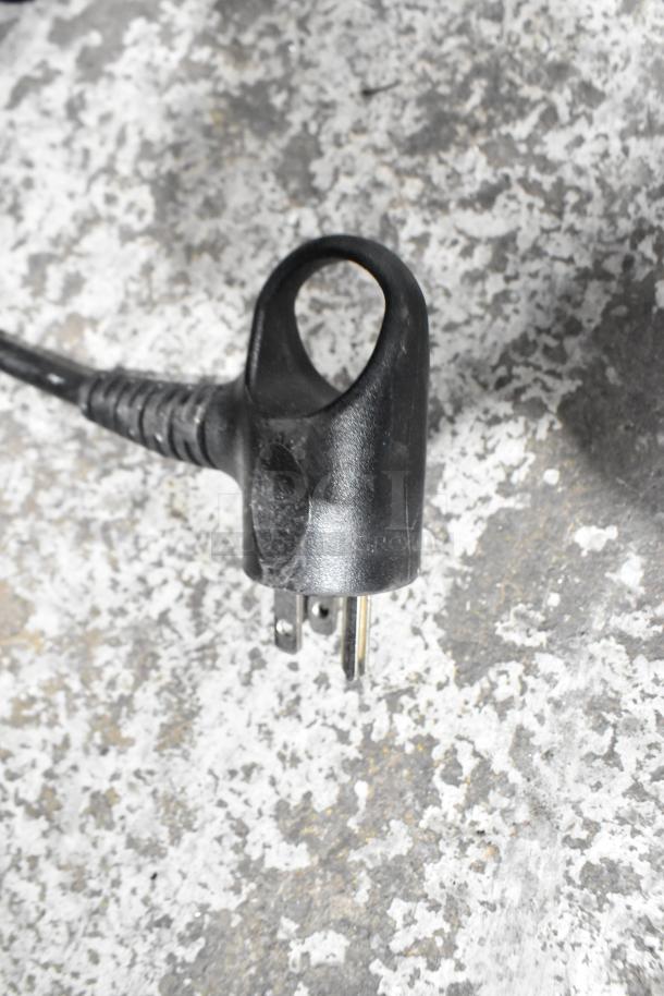 Close-up of a power plug for the 2020 Follett 15CI100A Commercial Ice Machine, 115 Volts, 1 Phase.