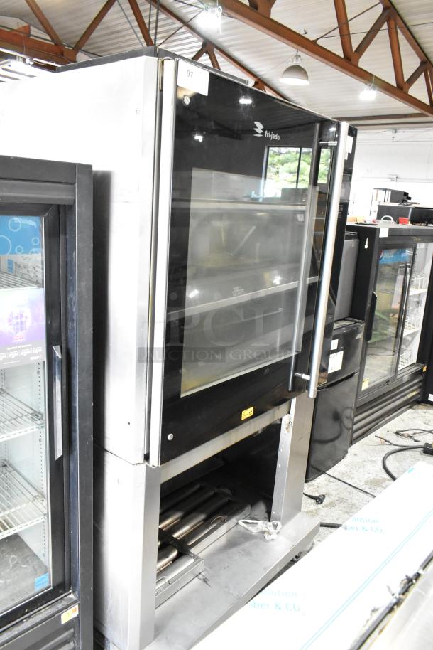 Fri-jado TDR7-P stainless steel commercial electric rotisserie oven, floor style, on casters, 208V, 3-phase.