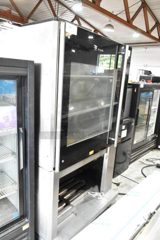 Fri-jado TDR7-P stainless steel commercial electric rotisserie oven, floor style, on casters, 208V, 3-phase.