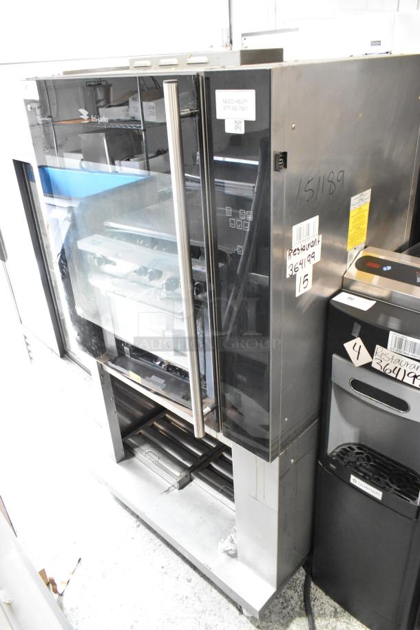 Fri-jado TDR7-P rotisserie oven, stainless steel, electric, 208V, 3 phase, on casters; restaurant-grade condition.
