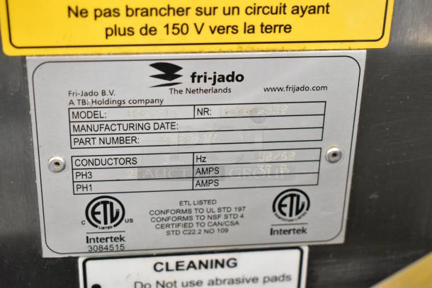 Fri-jado TDR7-P stainless steel commercial rotisserie oven label, 208V, 3-phase, ETL certified, on casters.