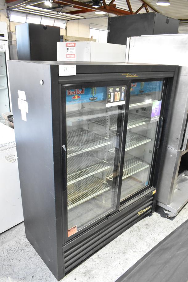 True GDM-41SL-60-LD 2-door cooler merchandiser with poly-coated racks, 115 volts, 1 phase, in good condition.