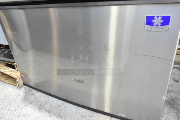 Manitowoc D970 stainless steel ice bin, 48", holds 882 lbs. Features visible branding, minor surface marks.