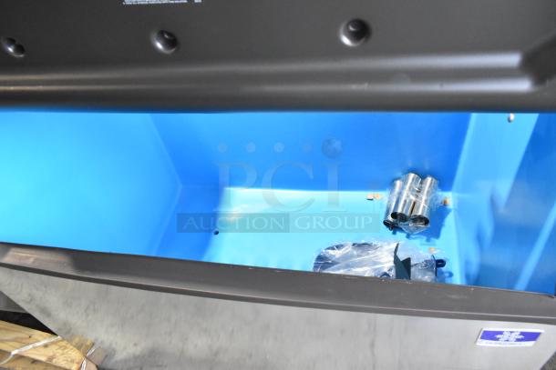 Manitowoc D970 stainless steel ice bin, 48" wide, 882 lbs capacity, commercial-grade, excellent condition.