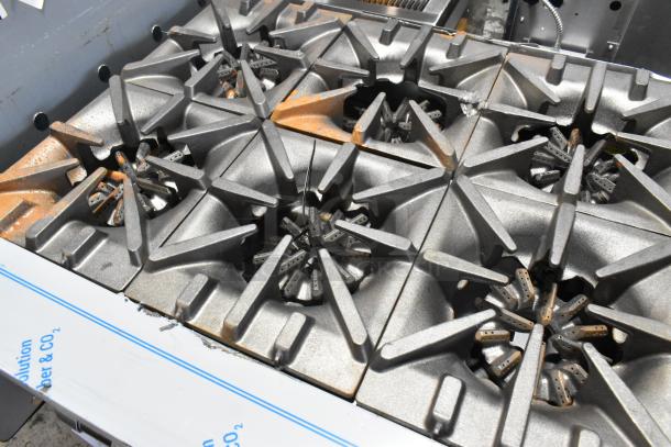 BRAND NEW Garland 372G366CN 6-burner gas range, stainless steel, convection oven, overshelf, 236,000 BTU, scratch and dent.