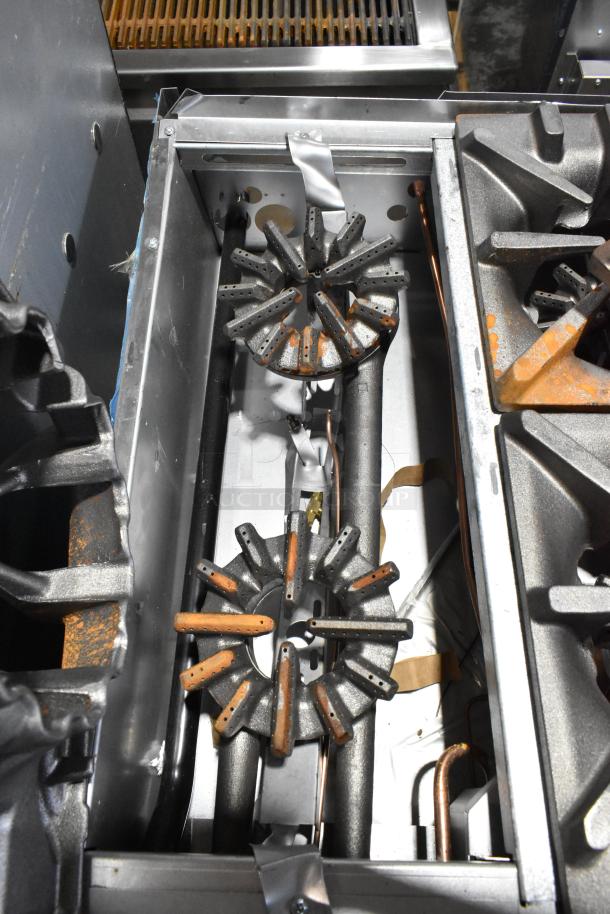 Alt text: Garland 372G366CN six-burner range with convection oven. Stainless steel, natural gas, new scratch and dent condition.