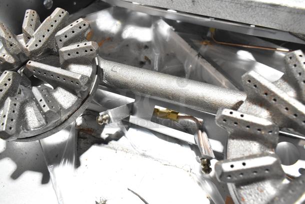 Brand new Garland 372G366CN 6 burner range components; stainless steel, natural gas, 236,000 BTU, scratch and dent.