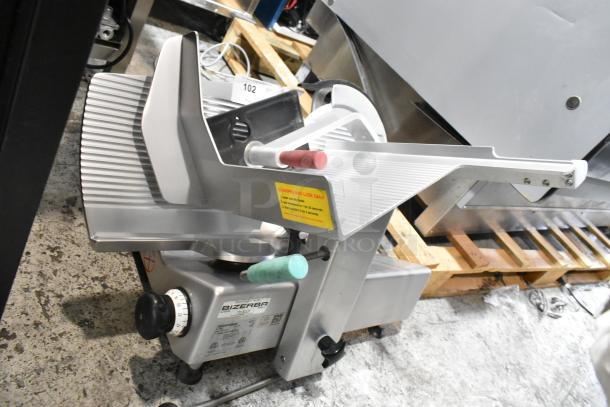 2019 Bizerba GSP H meat slicer, metal, 115V, 1 phase, commercial countertop model. Sharp condition, clear usage instructions visible.