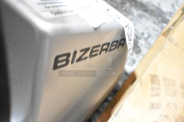 2019 Bizerba GSP H meat slicer, stainless steel, 115V, 1 phase. Close-up of brand logo. Good condition.