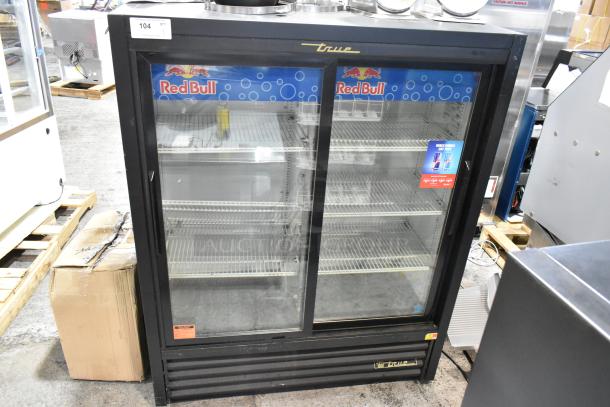 2019 True GDM-41SL-60-LD 2-door cooler, poly-coated racks, Red Bull branding, 115V, commercial use, good condition.
