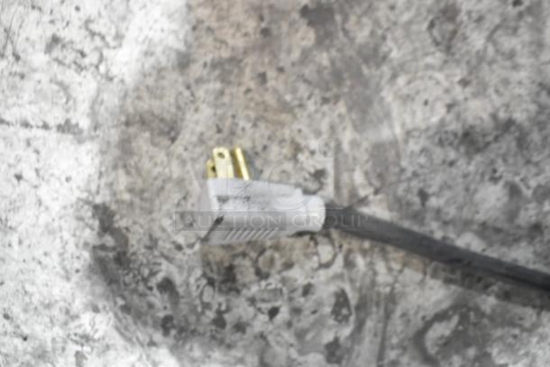 Power plug for 2019 True GDM-41SL-60-LD commercial cooler. Appears intact. Connects to 115-volt, 1-phase outlet.