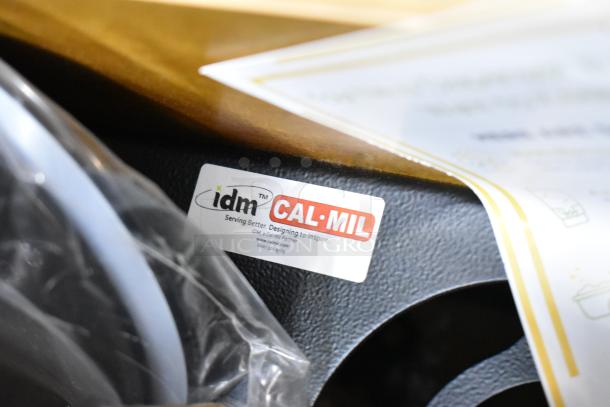 Cal-Mil 11-23F 3 Cylinder Dispenser, brand label visible, textured black finish, like-new condition.