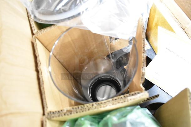Cal-Mil 11-23F 3 Cylinder Dispenser in packaging, transparent design, includes user guide. Appears in new condition.