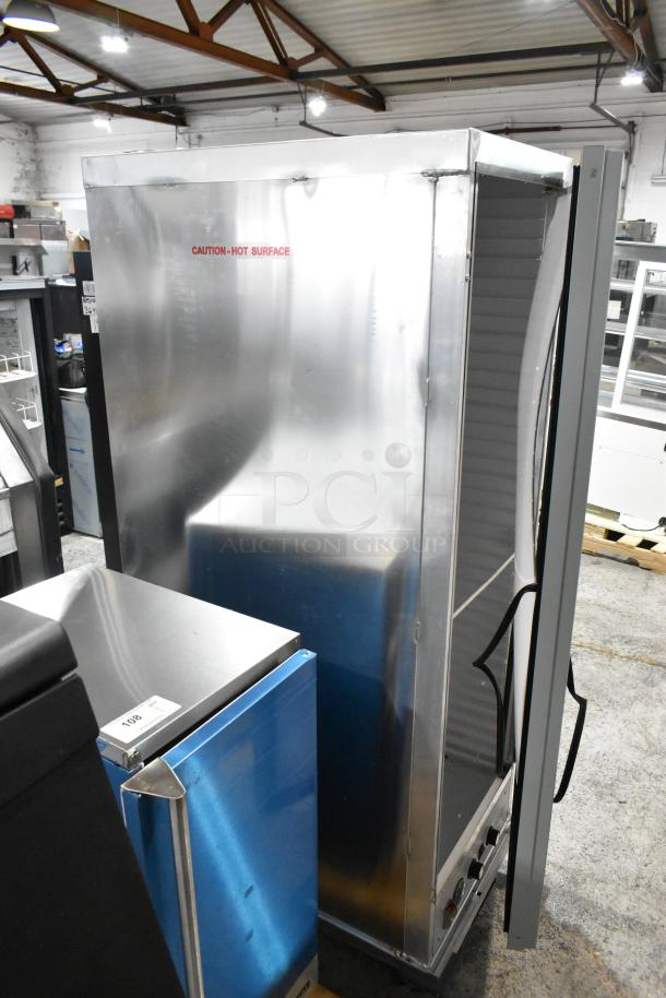Brand new 2025 Mainstreet 541CHP1836I full-size heated holding cabinet with clear door, minor dents, on commercial casters.