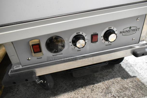 Mainstreet 541CHP1836I heated holding cabinet with clear door, commercial casters; features control panel for temperature and humidity.