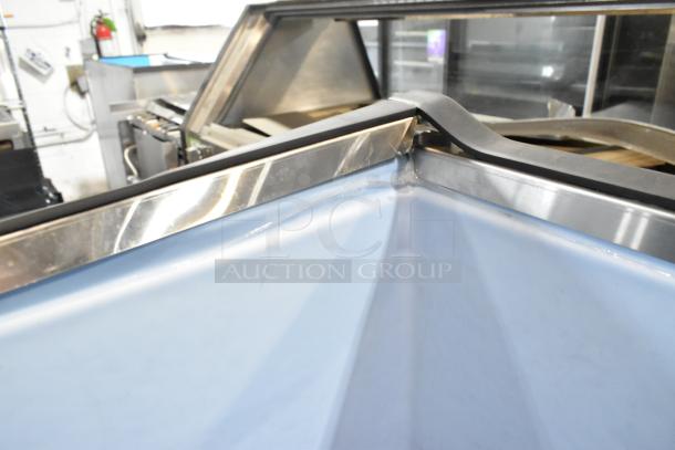 Brand new 2021 Avantco 194BIN40022 ice storage bin, metallic alloy exterior, 383 lb capacity, minor scratches, interior view.