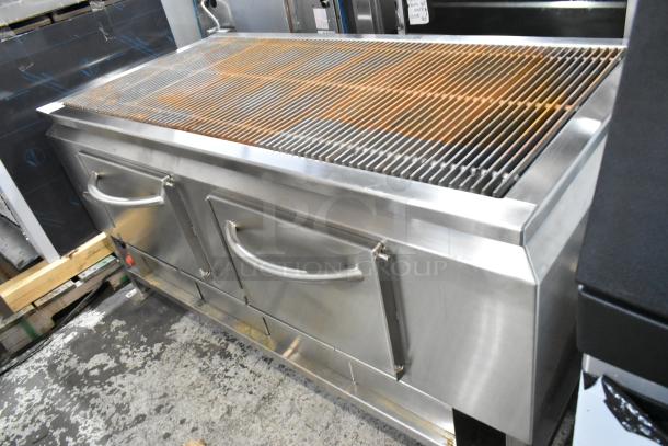 Brand new Champion Tuff 782TG60, 60" stainless steel wood-burning grill, features scratches and dents, double doors.