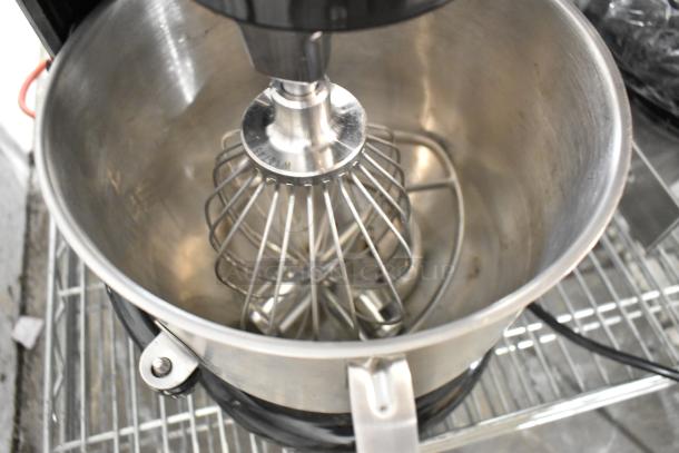 Brand new KitchenAid KSM8990OB black 8 Qt. mixer with metal bowl, paddle, whisk, and dough hook. Scratch and dent condition.