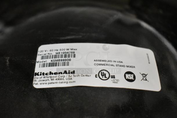 KitchenAid KSM8990OB label showing model, serial number, voltage, and certification marks. Assembled in USA.