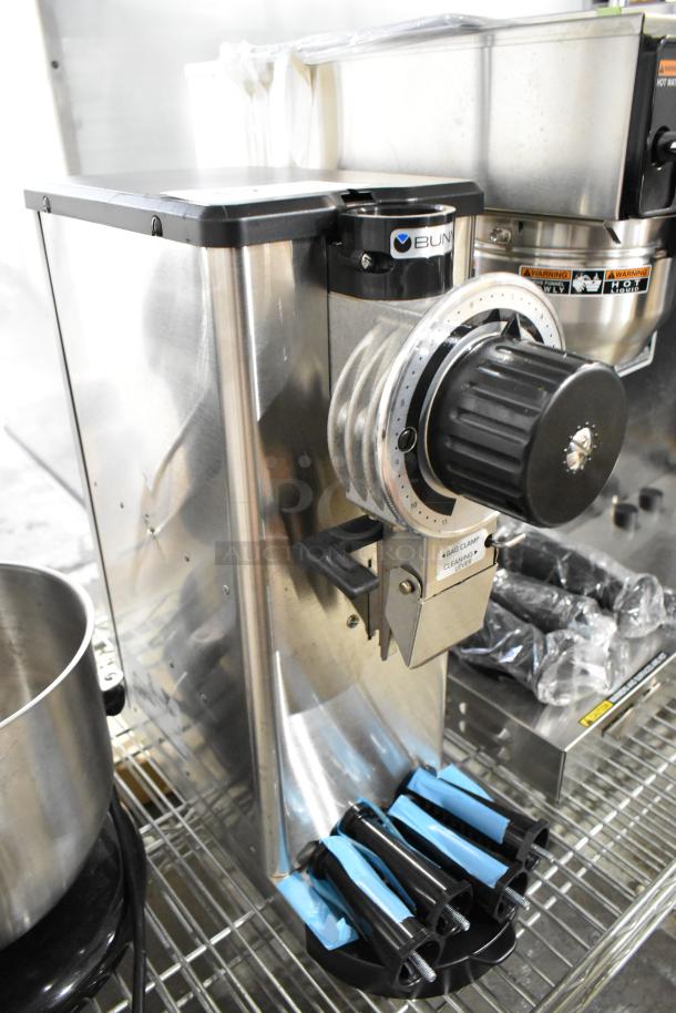 BRAND NEW SCRATCH AND DENT! 2025 Bunn GVH 1 lb. stainless steel commercial coffee grinder, no hopper, 120V, minor exterior dent.