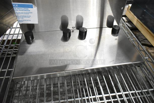 Brand new Bunn AXIOM TWIN APS coffee brewer, scratch and dent. Includes hot water dispenser, two metal brew baskets.
