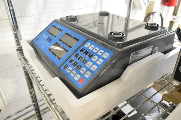 BRAND NEW AvaTek 334PCS60 digital price computing scale, 60 lb. capacity. Slight scratch and dent. Model label visible.