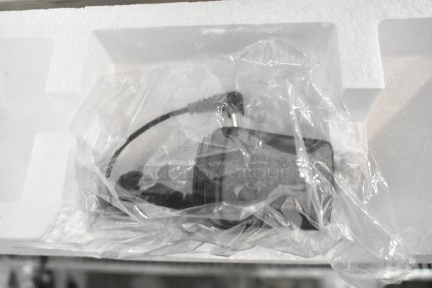 Brand new AvaTek 334PCS60 digital price computing scale, 60 lb. capacity, shown packaged with accessories in clear plastic.