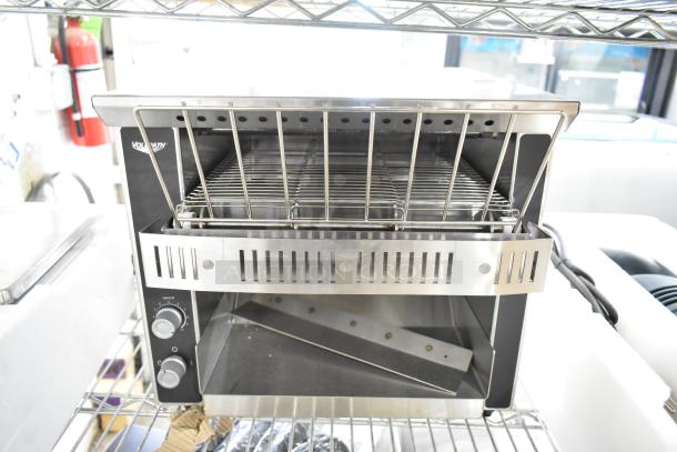 BRAND NEW SCRATCH AND DENT Vollrath CT2-120350 JT1 Conveyor Toaster, 1.5" Opening, 120V, shown on a metal shelf.