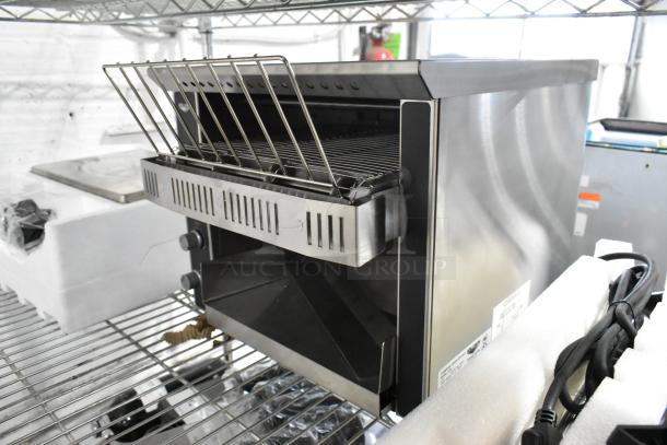 Brand new Vollrath CT2-120350 JT1 conveyor toaster, 1 1/2" opening, minor scratch and dent, 120V, 1 phase.