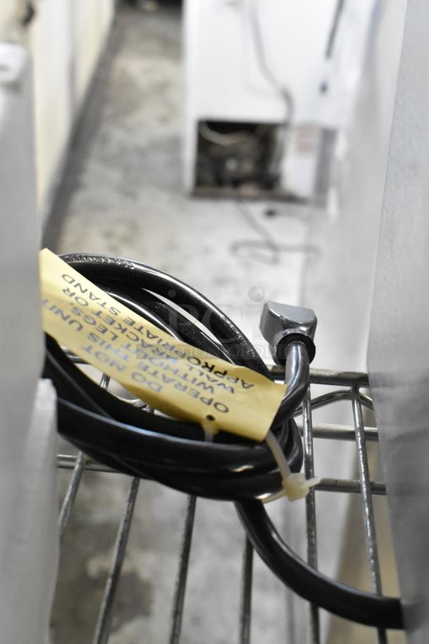 BRAND NEW Vollrath CT2-120350 JT1 Conveyor Toaster, 120V, 1 Phase, with cord and yellow tag indicating operational instructions.