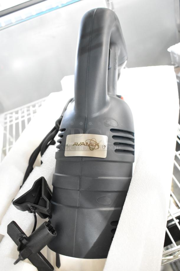 Brand new 2024 AvaMix 928IBHD12 12" immersion blender, heavy-duty, 1 1/4 hp, 120V. Minor scratches, visible AvaMix label.