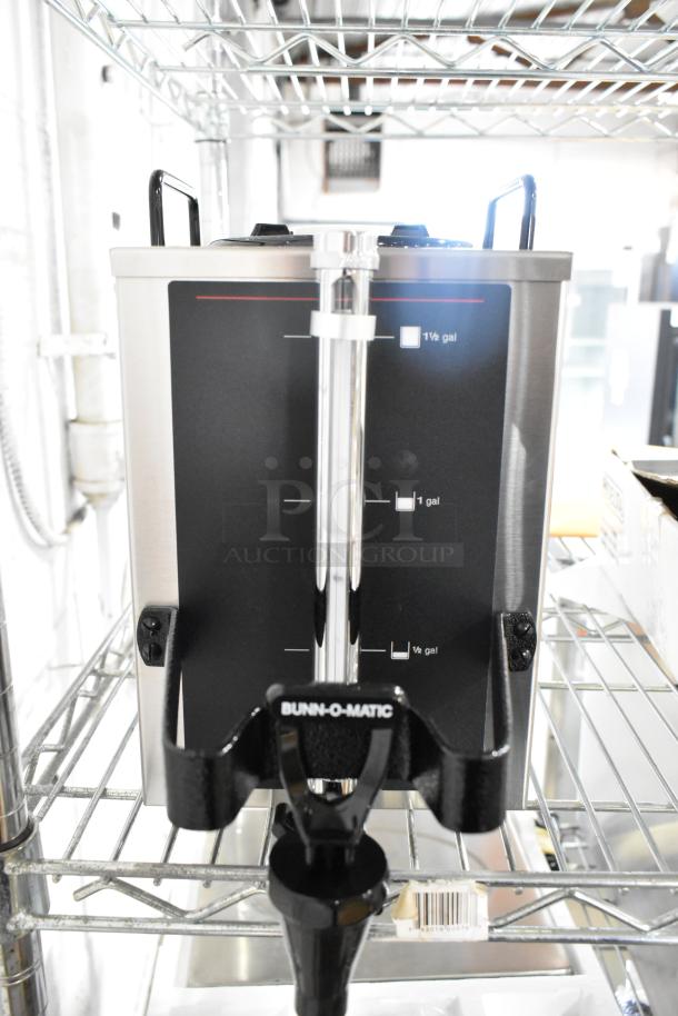 Brand new Bunn 20950.0004 1.5GPR-FF coffee server, 1.5-gallon capacity, top handles, fast flow faucet, slight dents.